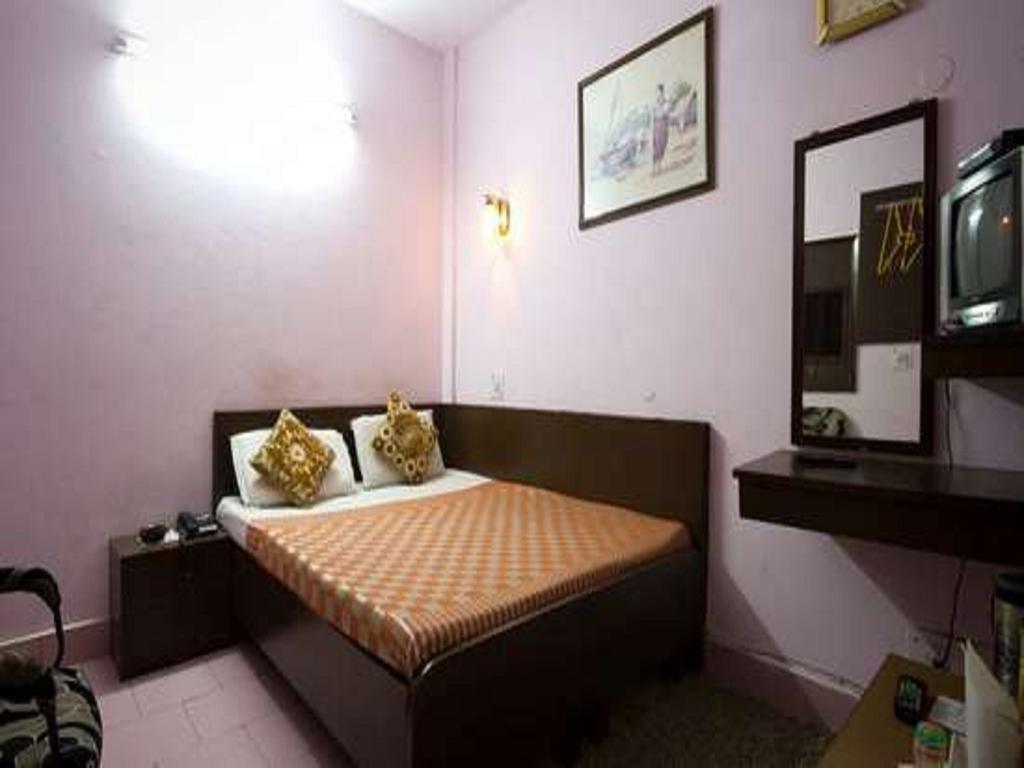 Hotel Woodland Deluxe Nueva Delhi Habitación foto
